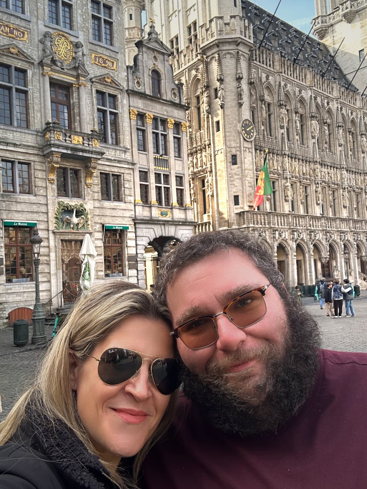 Gabe and Monica, founders of Cabin Companions, standing together in Brussels — ready to help pet owners book pet travel with personalized, in-cabin services.
