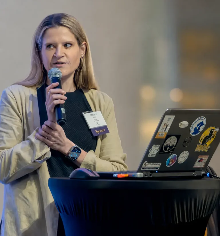 Monica Tarant speaking at an animal-welfare conference
